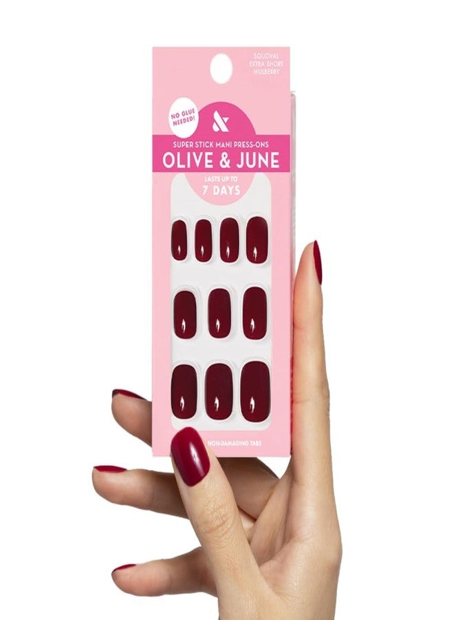 أظافر لاصقة كلاسيكية من Olive & June | قصيرة جدًا بتصميم مربع بيضاوي | لا حاجة للغراء | 32 ظفرًا لاصقًا بـ 16 مقاسًا | لاصقات غير سامة، سهلة التركيب والإزالة، لا تسبب ضررًا، مظهر طبيعي | تدوم حتى 7 أيام | لون عنابي مائل للتوتي - Image 1